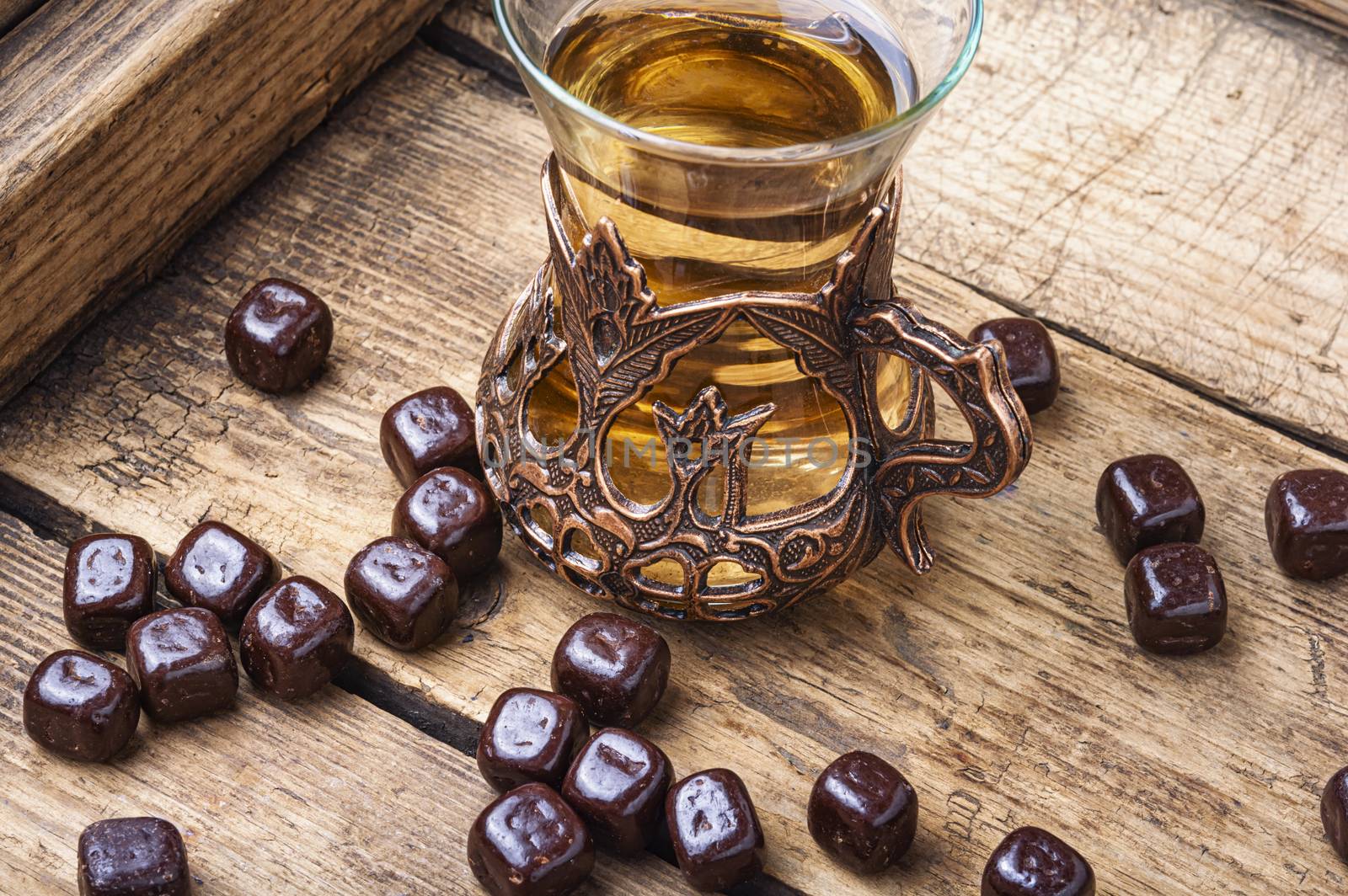 Turkish tea on wooden table by LMykola