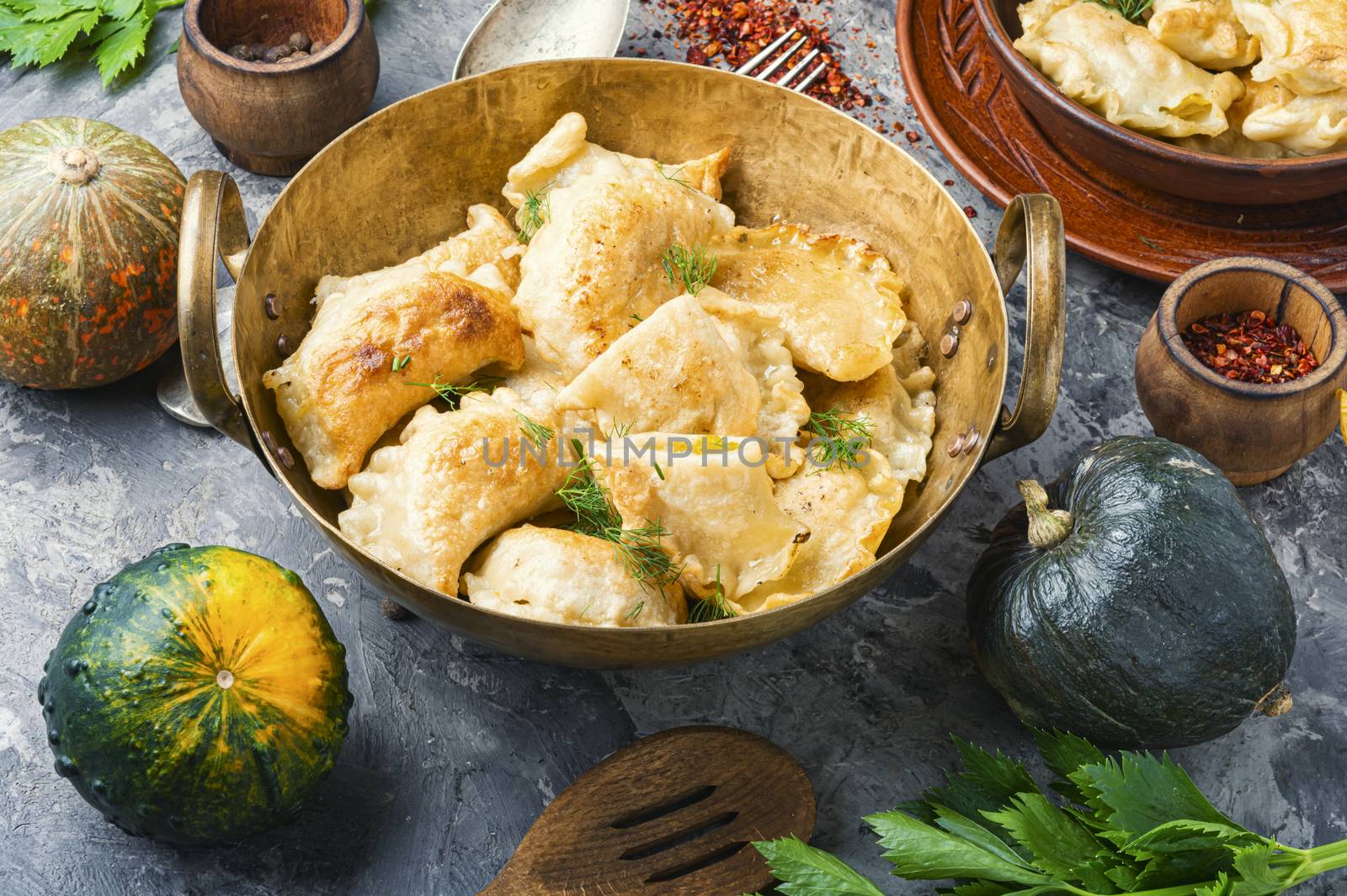 Traditional pumpkin dumplings or vareniki.Fried pumpkin vareniki.Autumn food
