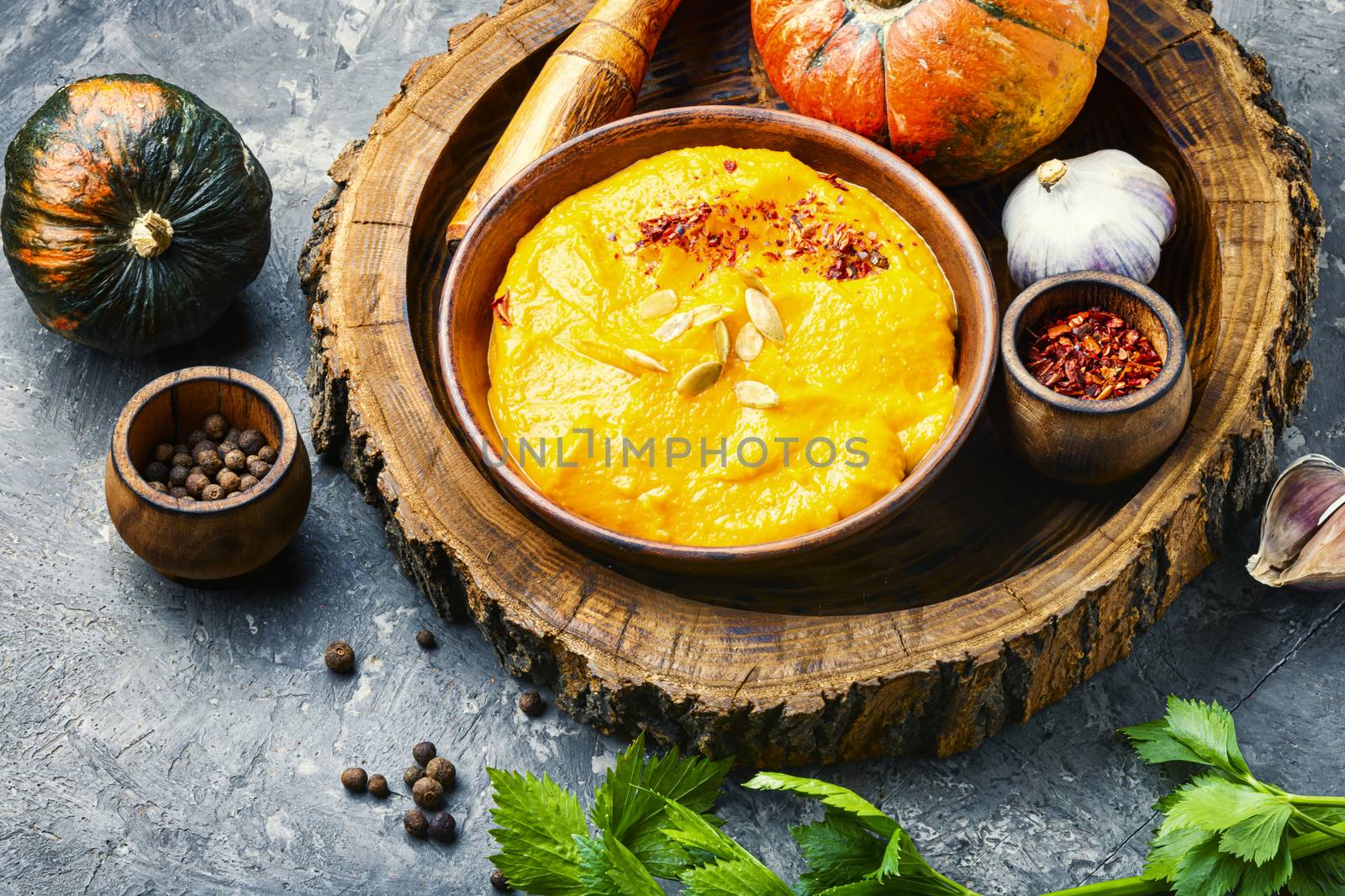 Vegetarian autumn pumpkin cream soup.Seasonal autumn food