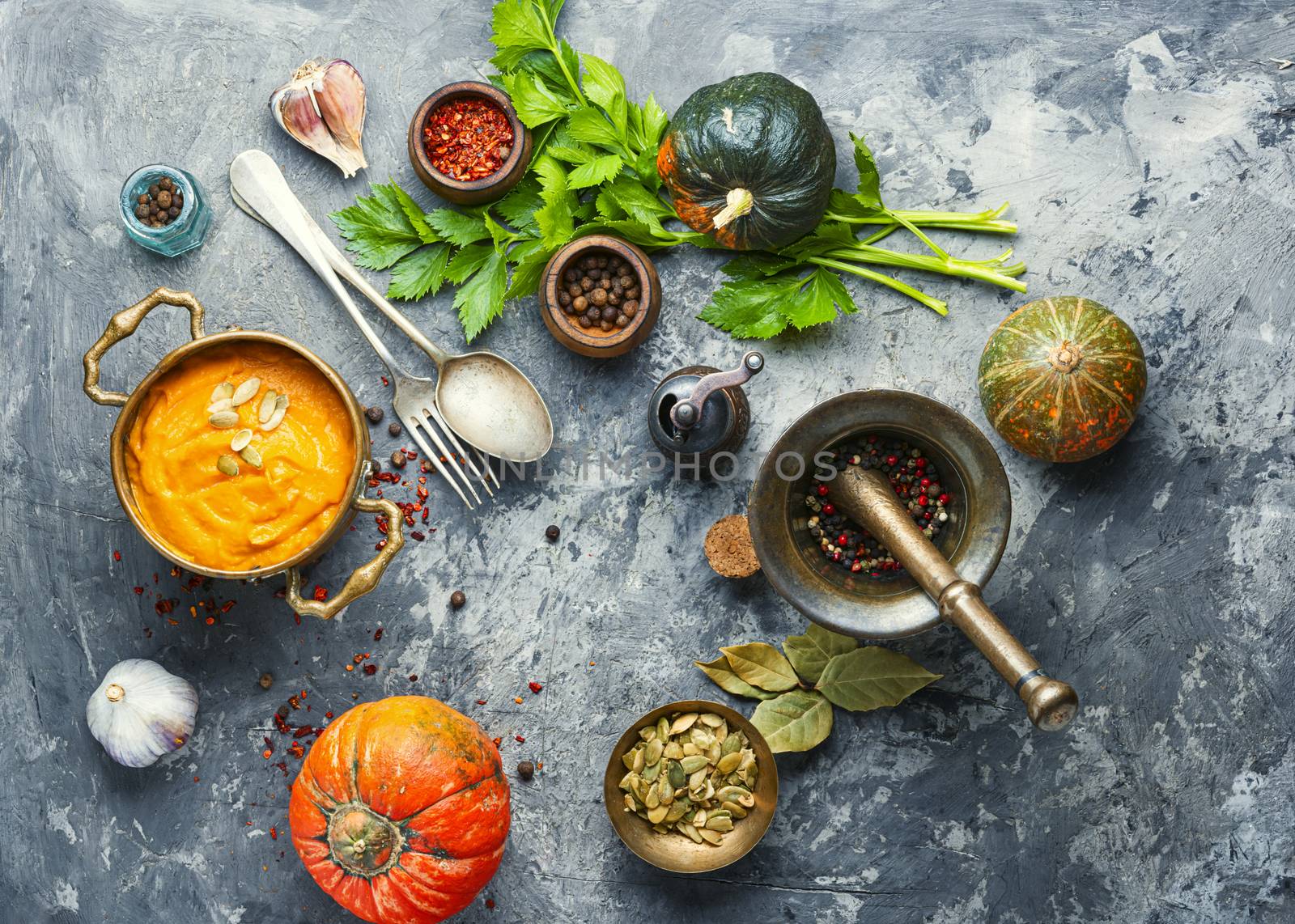 Vegetarian autumn pumpkin cream soup.Pumpkin soup and organic pumpkins