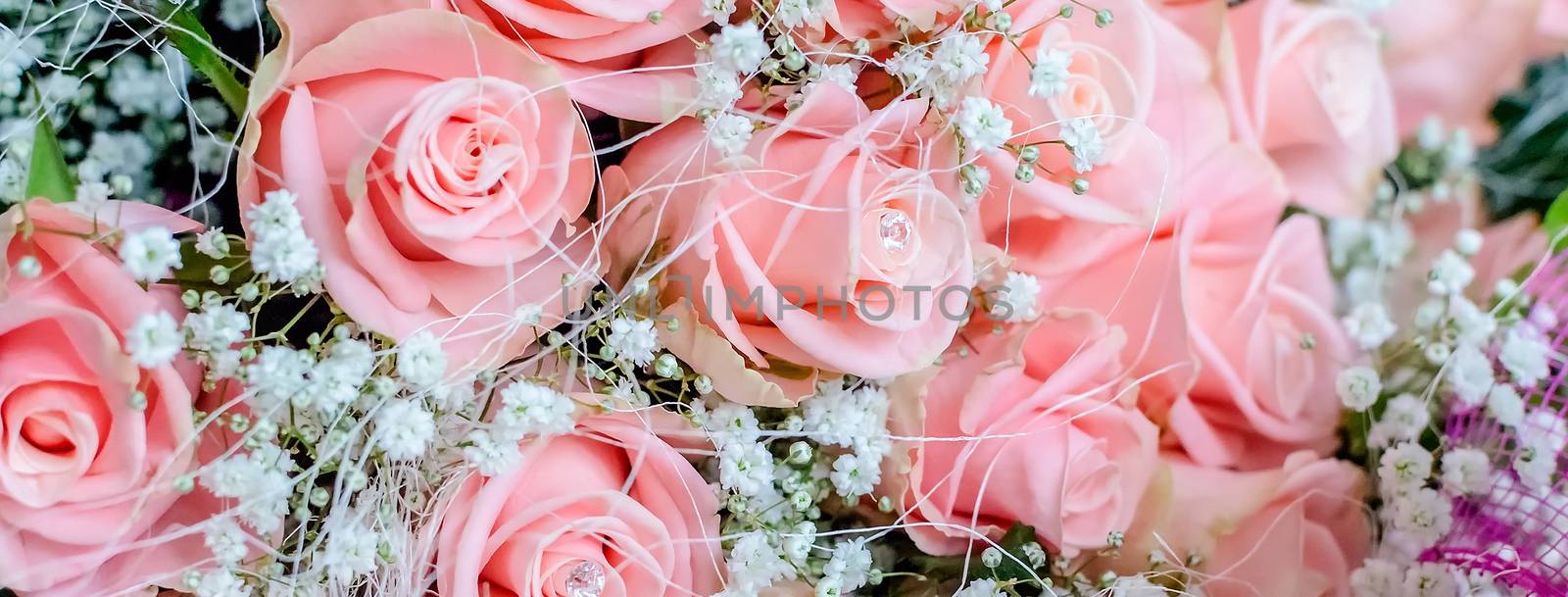 Bouquet of pink roses with small briliants. Romantic concept for Valentine's Day