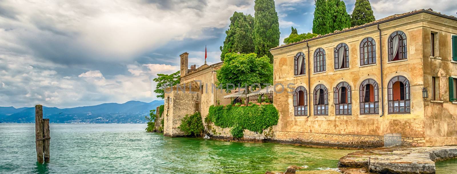 Lake Garda at Punta San Vigilio, Town of Garda, Italy by marcorubino