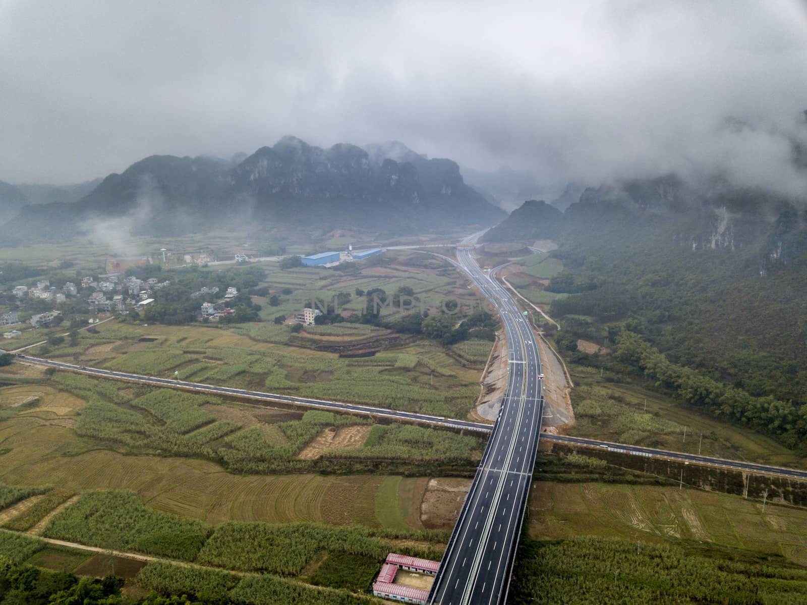 The Chongshui Expressway S62 in karst mountains of Guangxi, China.