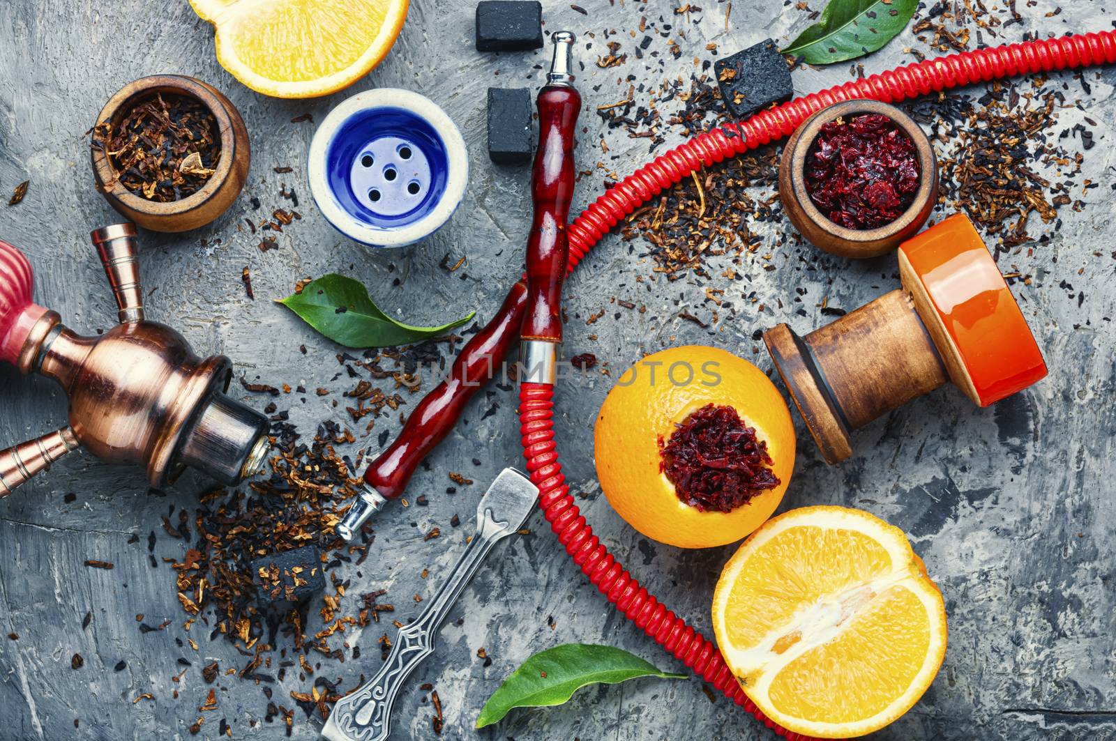 Details of tobacco hookah and tobacco with orange aroma.Fruit shisha