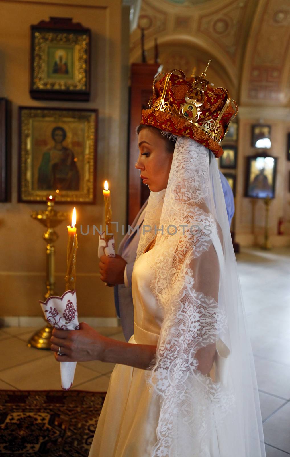 The beautiful wedding ceremony in the Russian Church. Moscow, Russia