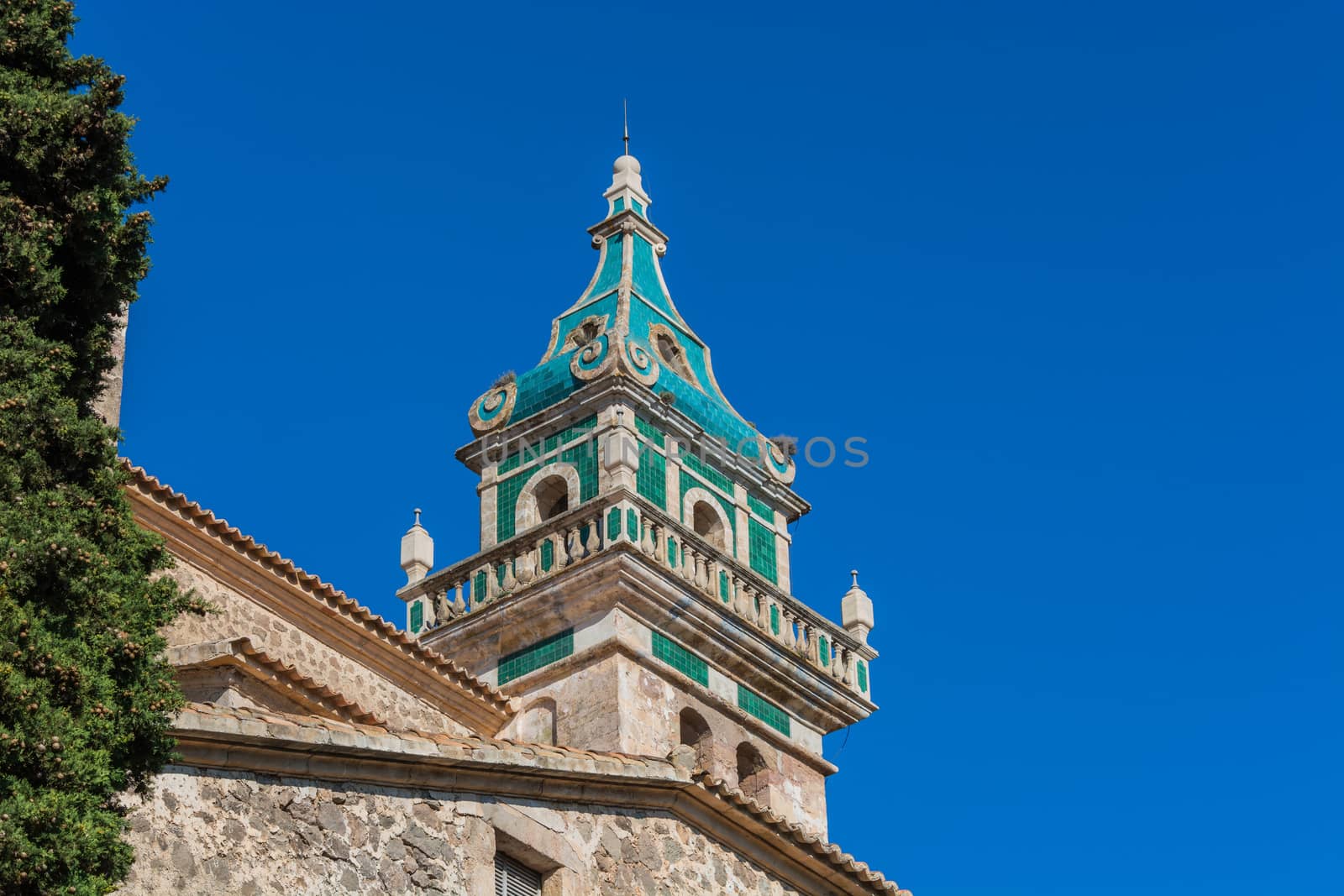 Beautiful view. Tower of the monastery in Valldemossa. Close to the Sierra de Tramuntana.
