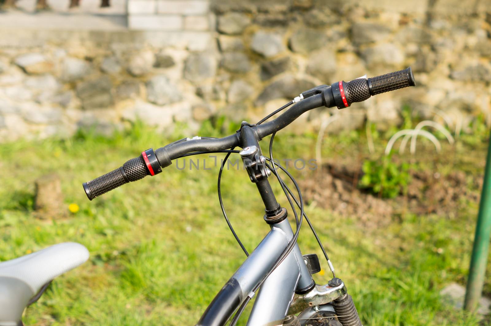 Bicycle handlebar on the lawn during active walks .For your design