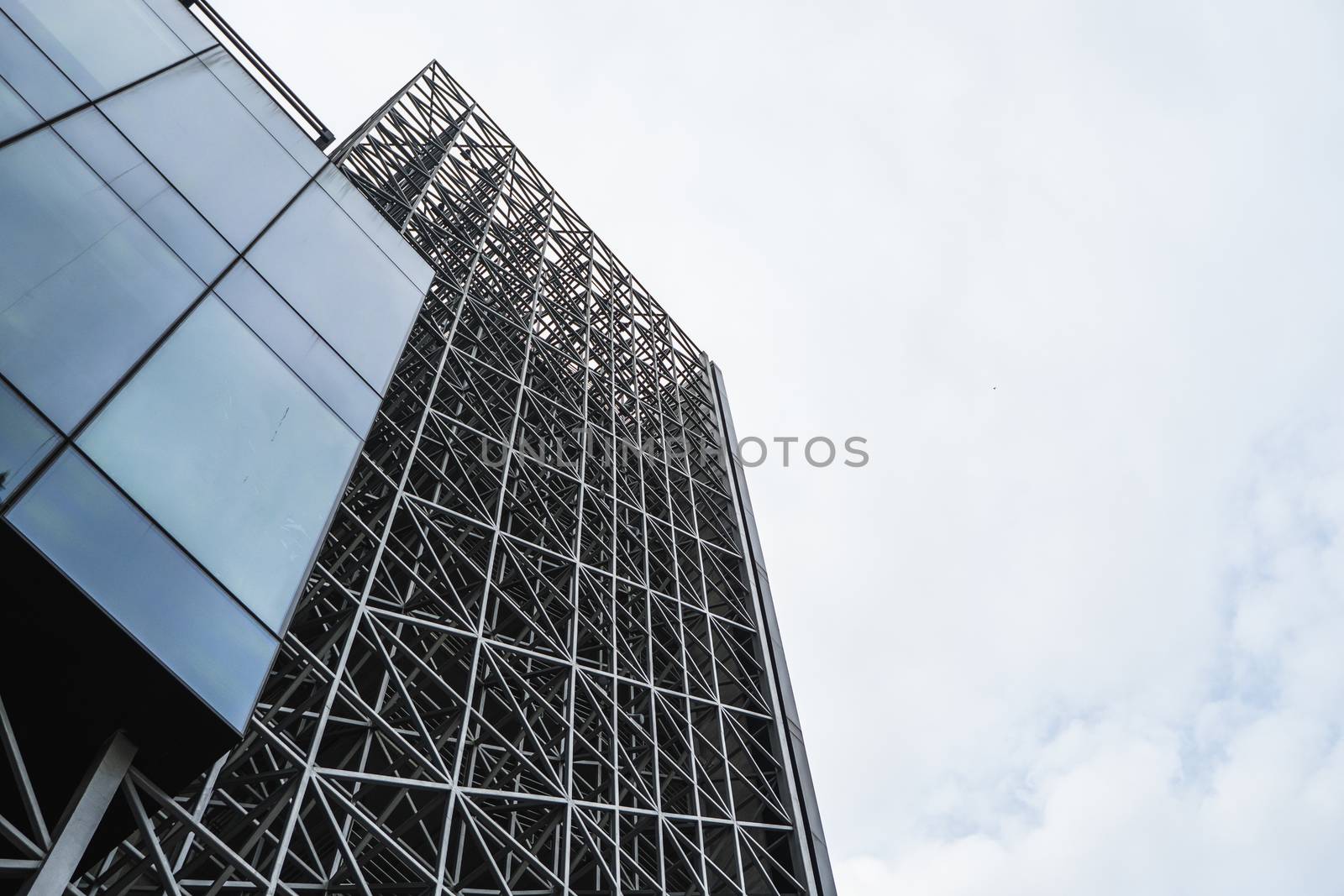 Constuction site of modern automated storehouse with a cloudy day. by vovsht