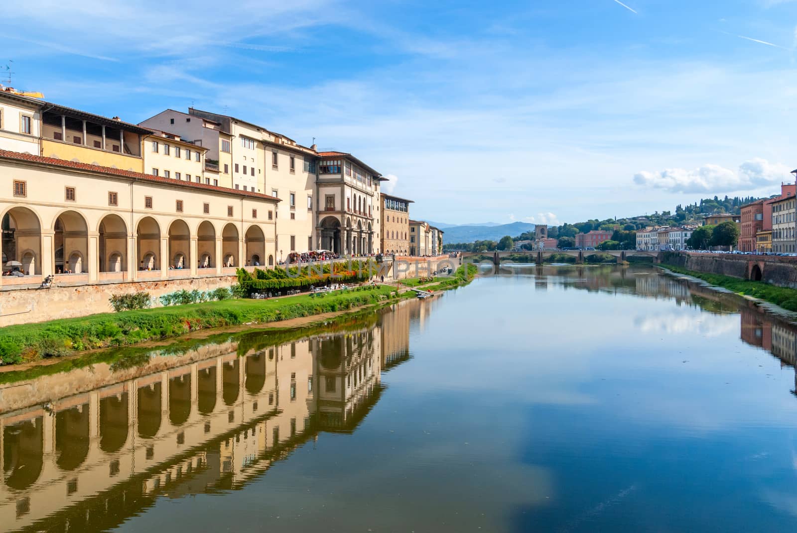 View of stone bridge over Arno river in Florence, Tuscany, Italy. by Zhukow