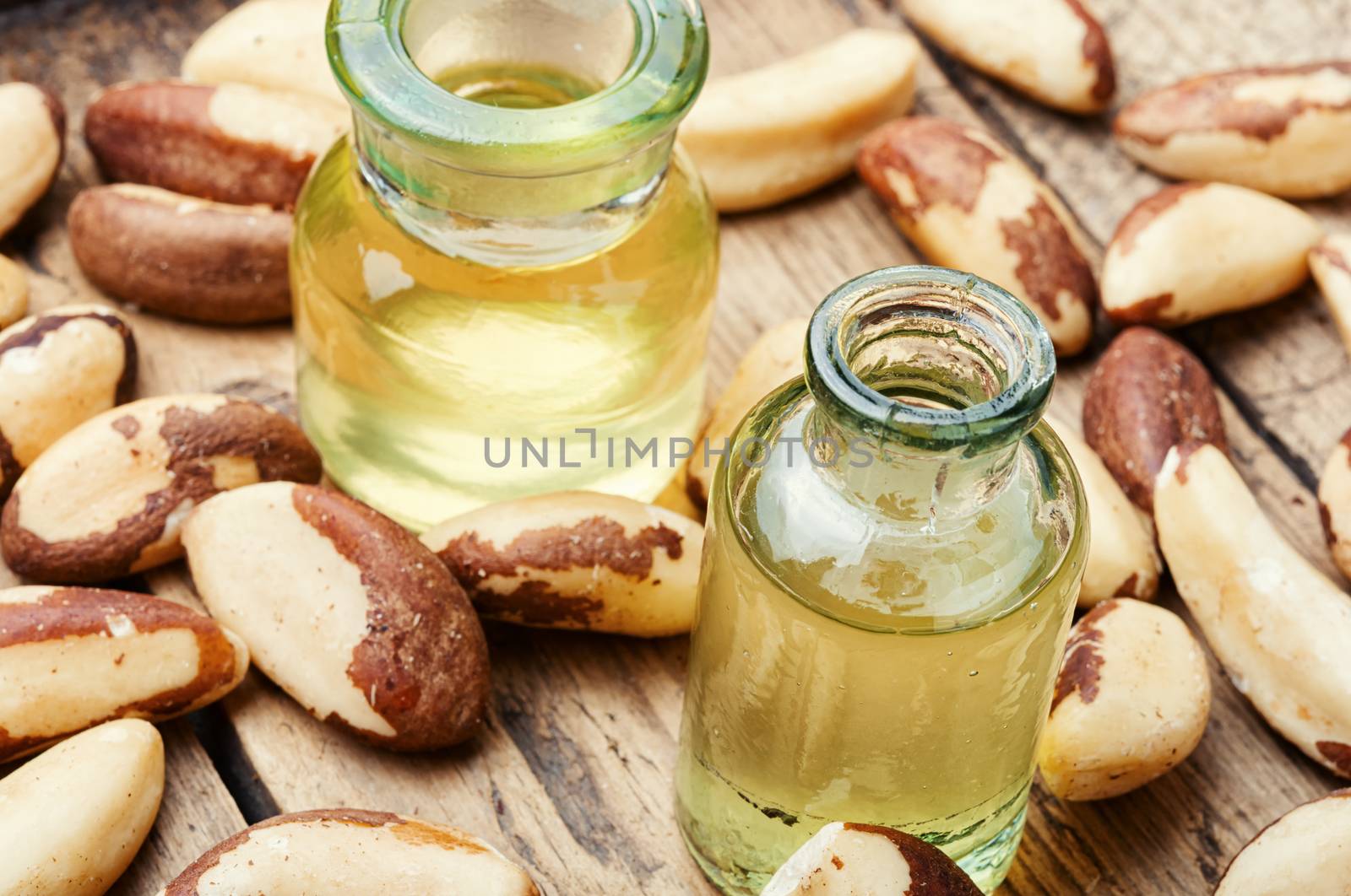 Gourmet peeled Brazil nut and jars of oil.