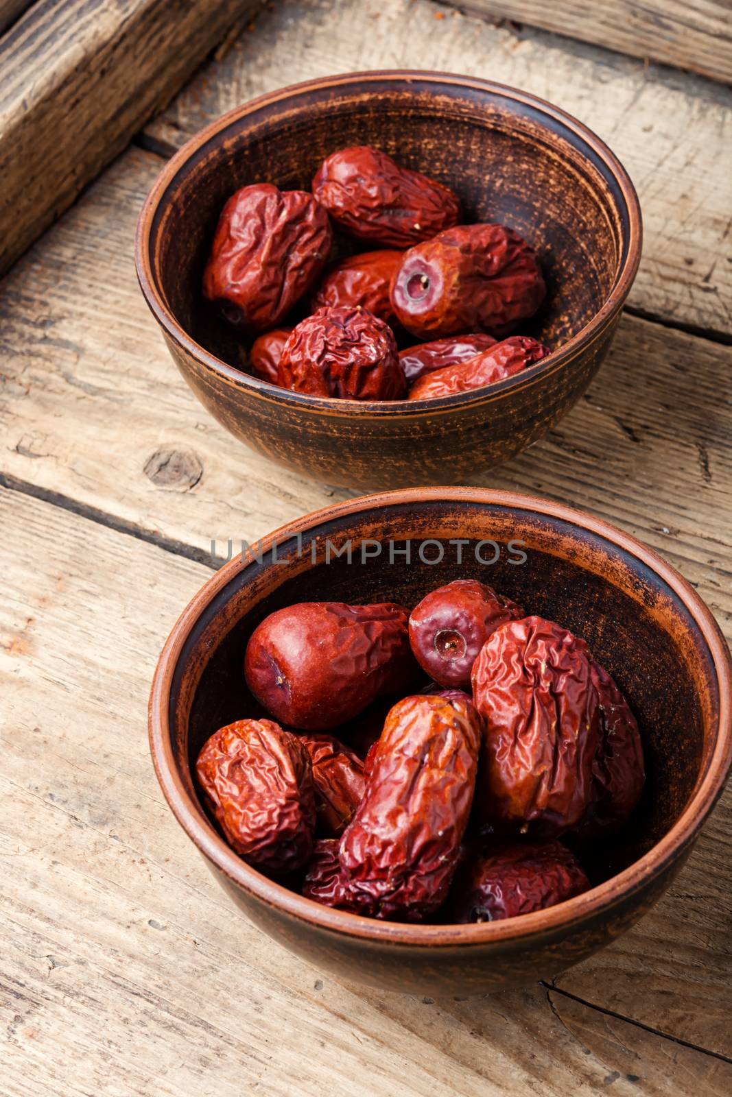 Bowl of dried unabi fruit or jujube.Medicinal and edible plant