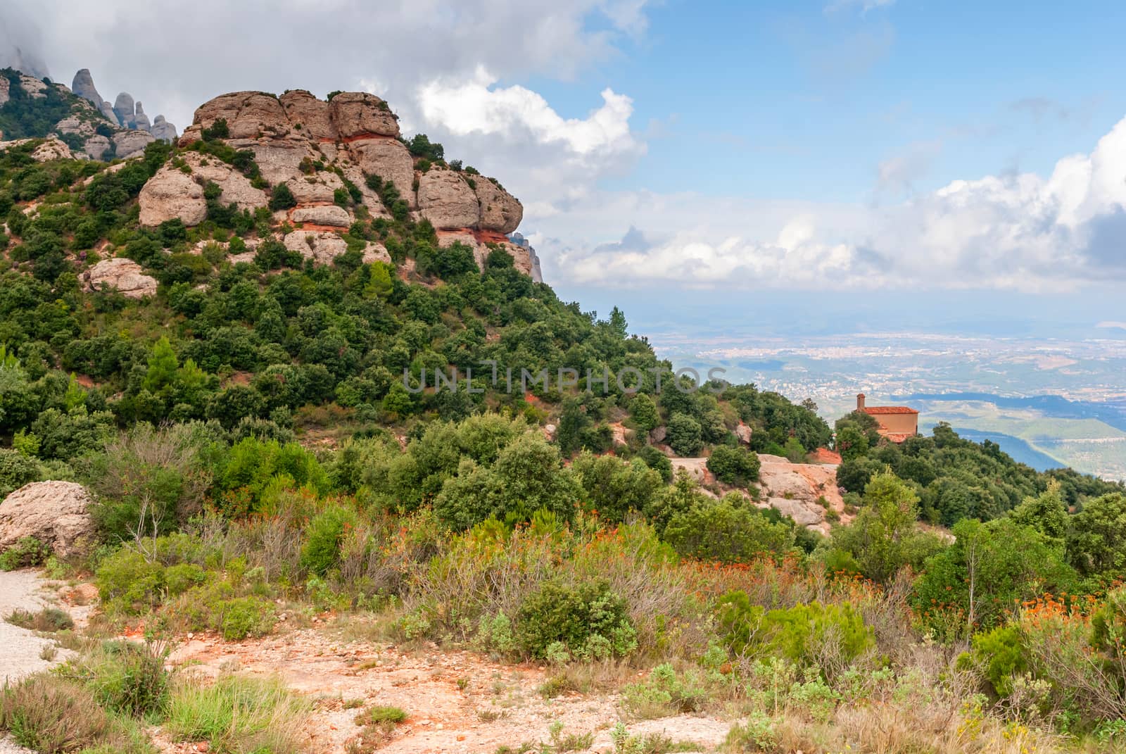Breathtaking view to Montserrat mountain range on a sunny summer day near Barcelona, Catalonia, Spain