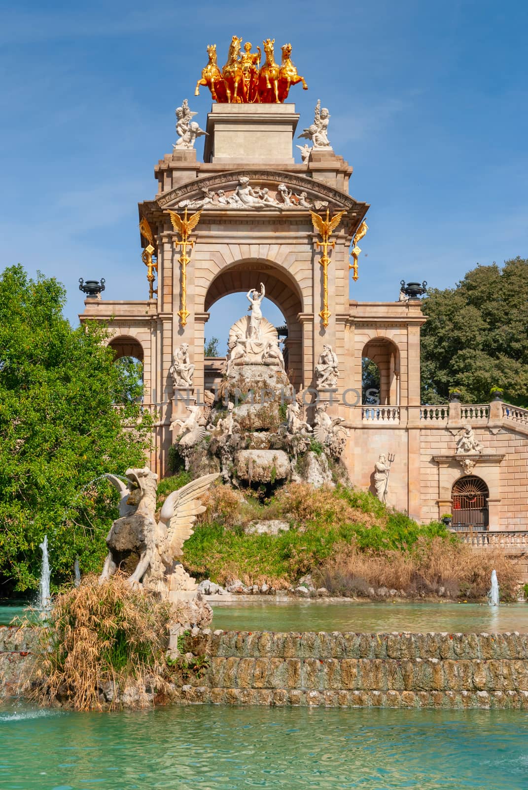 View of Cascada at Parc de la Ciutadella - a triumphal arch with waterfall and fountain built for 1888 Universal exhibition. Baroque construction was designed by Josep Fontsere. Barcelona. Spain.