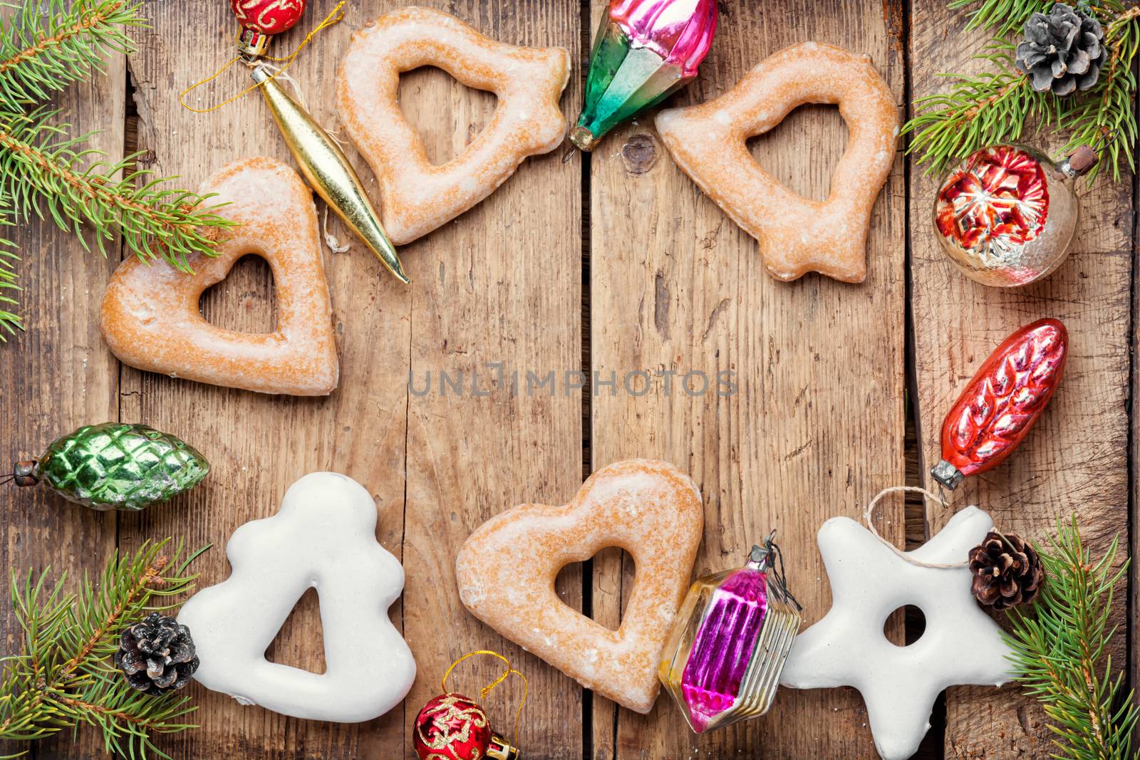 Christmas homemade gingerbread cookies and bauble.Winter holidays background