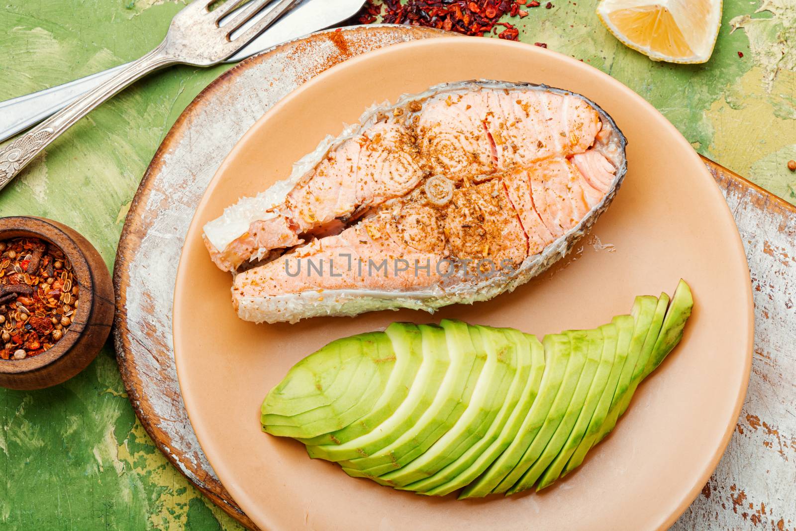 Steak of boiled diet salmon and avocado.Fish food.Healthy food.