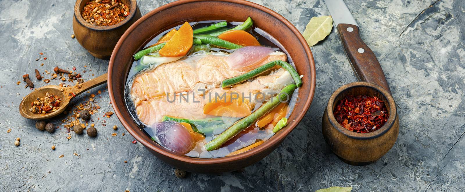 Appetizing dietary boiled salmon or trout.Fish soup.Long banner