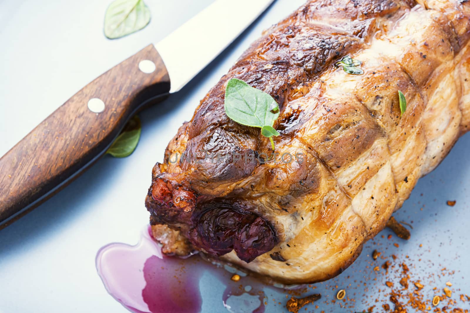 Baked pork meat stuffed with cherries.Baked pork.