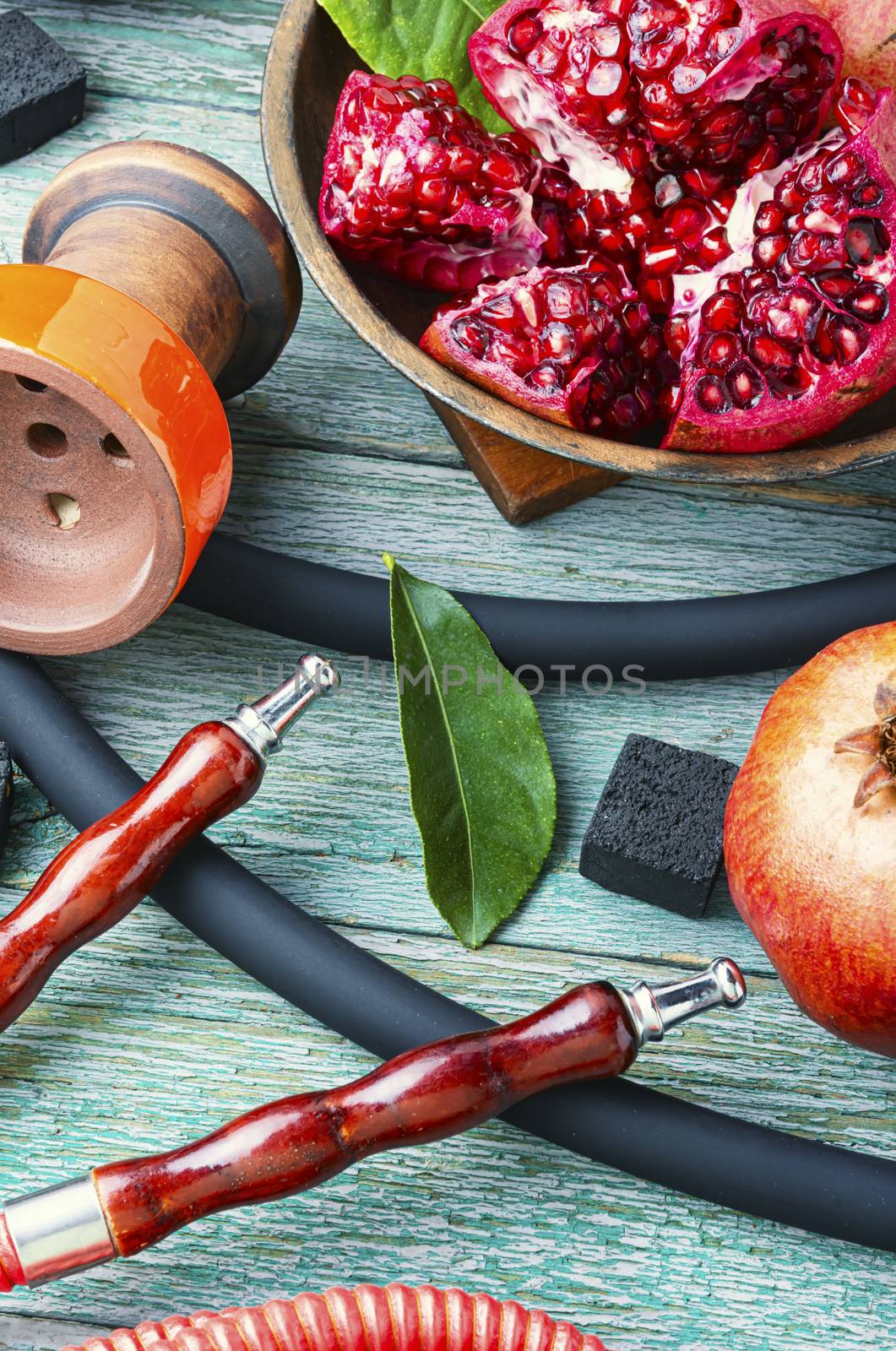 Oriental smoking hookah.Pomegranate flavor hookah.Fruit tobacco shisha