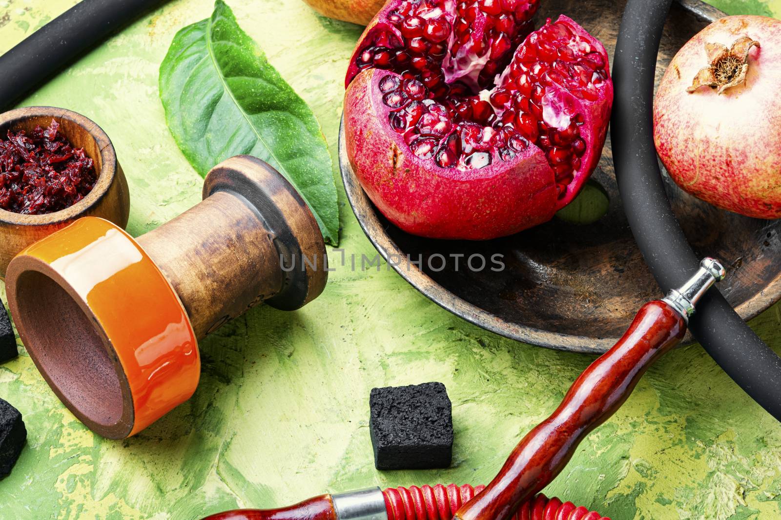 Arabic smoking hookah.Pomegranate flavor hookah.Fruit tobacco shisha