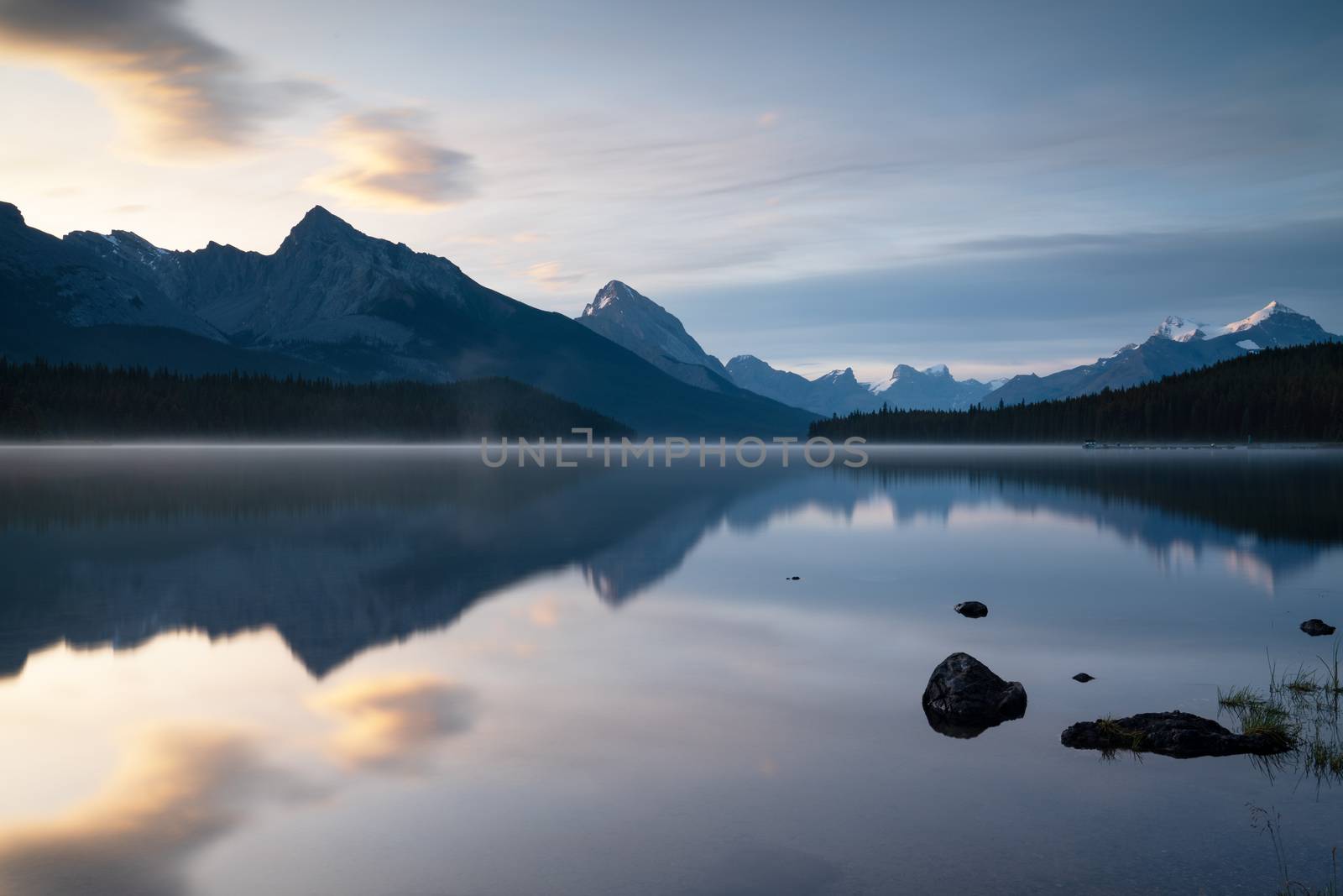 Long exposure panoramic image of the Maligne Lake close to Jasper with early morning mood, Alberta, Canada