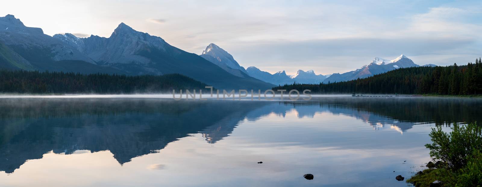 Panoramic image of the Maligne Lake close to Jasper with early morning mood, Alberta, Canada