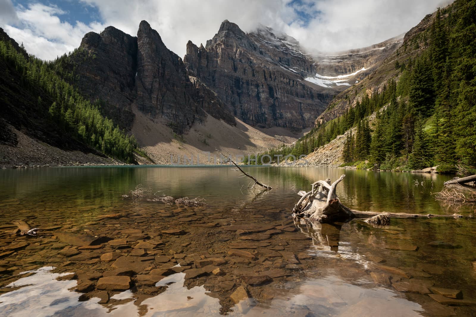 Panoramic image of Lake Agnes, a quiet place surrounded by the Rocky Mountains close to Lake Louise, Banff National Park, Alberta, Canada