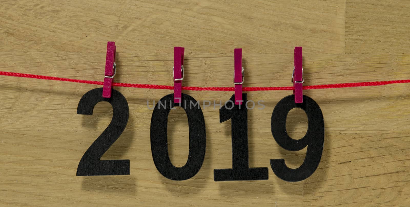 2019 numers hanging on the washing line with clothespins