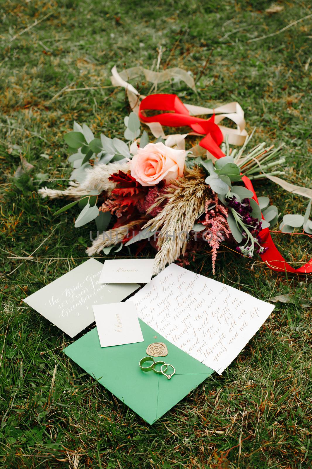 Wedding details flat lay. Wedding invitation. Ring box. Wedding bouquet. Copy space. Mock up. Envelope.