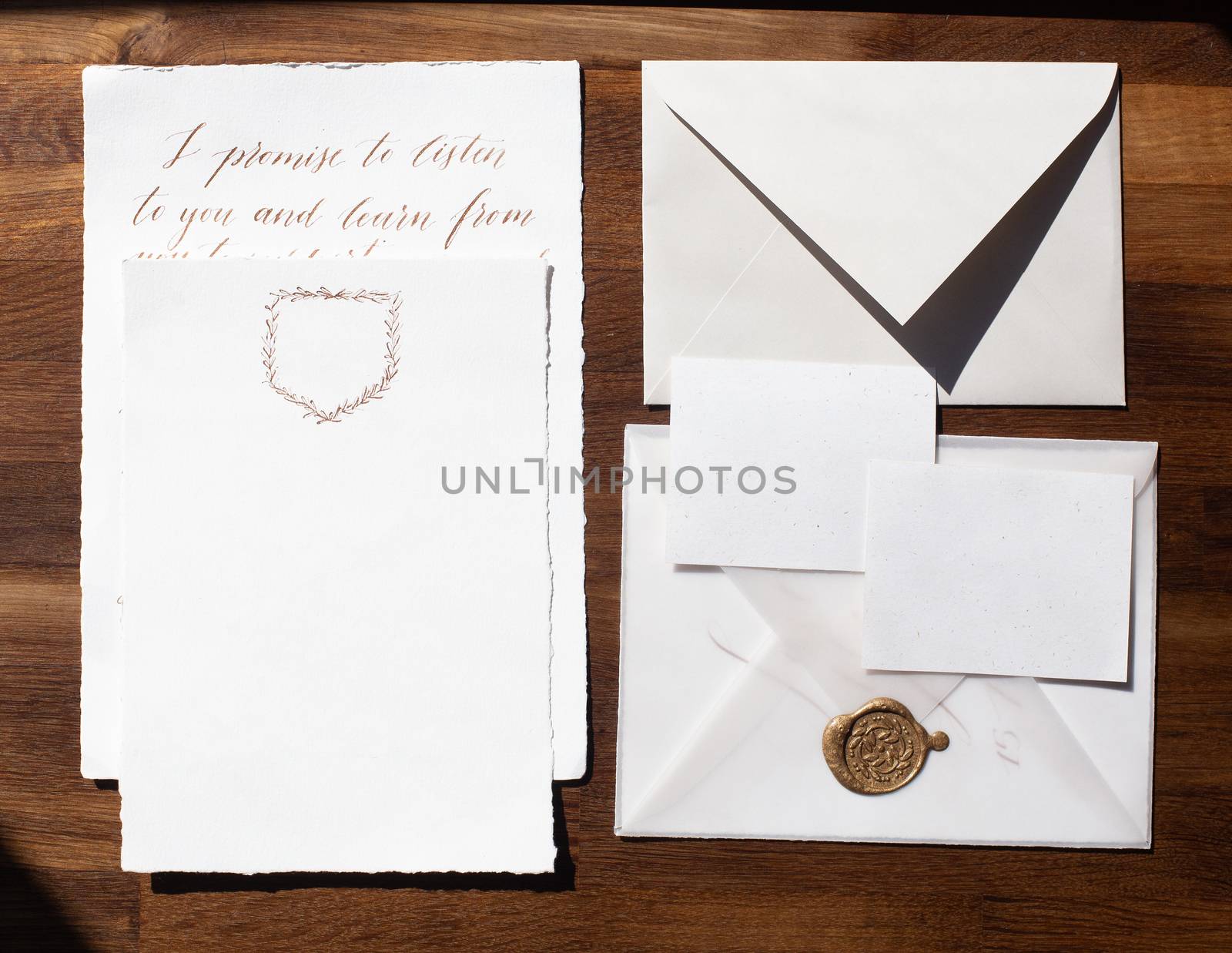 Wedding details flat lay on wooden background. Wedding invitation. Wedding bouquet. Mock up. Envelope. Copy space. by Denys_N