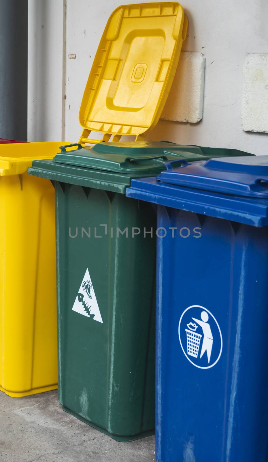 Garbage Trash Bins for collecting a recycle materials. Garbage trash bins for waste segregation. Separate waste collection food waste, plastic, paper and danger waste. Recycling. Environment