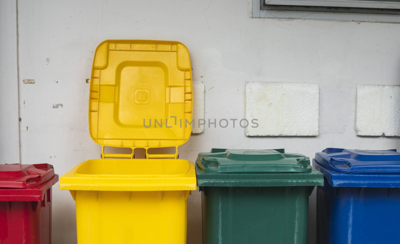 Garbage Trash Bins for collecting a recycle materials. Garbage trash bins for waste segregation. Separate waste collection food waste, plastic, paper and danger waste. Recycling. Environment. by vovsht