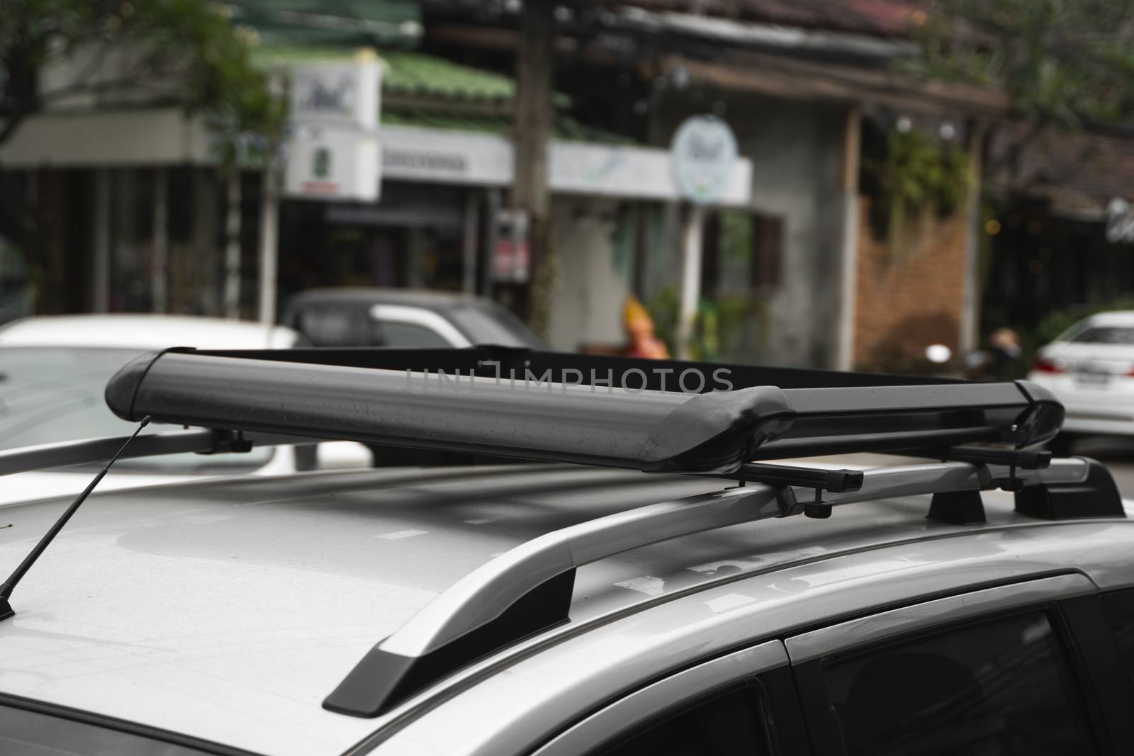 Trunk on the roof of the car for attaching large loads. Roof trunk for bicycle transportation, traveling by car