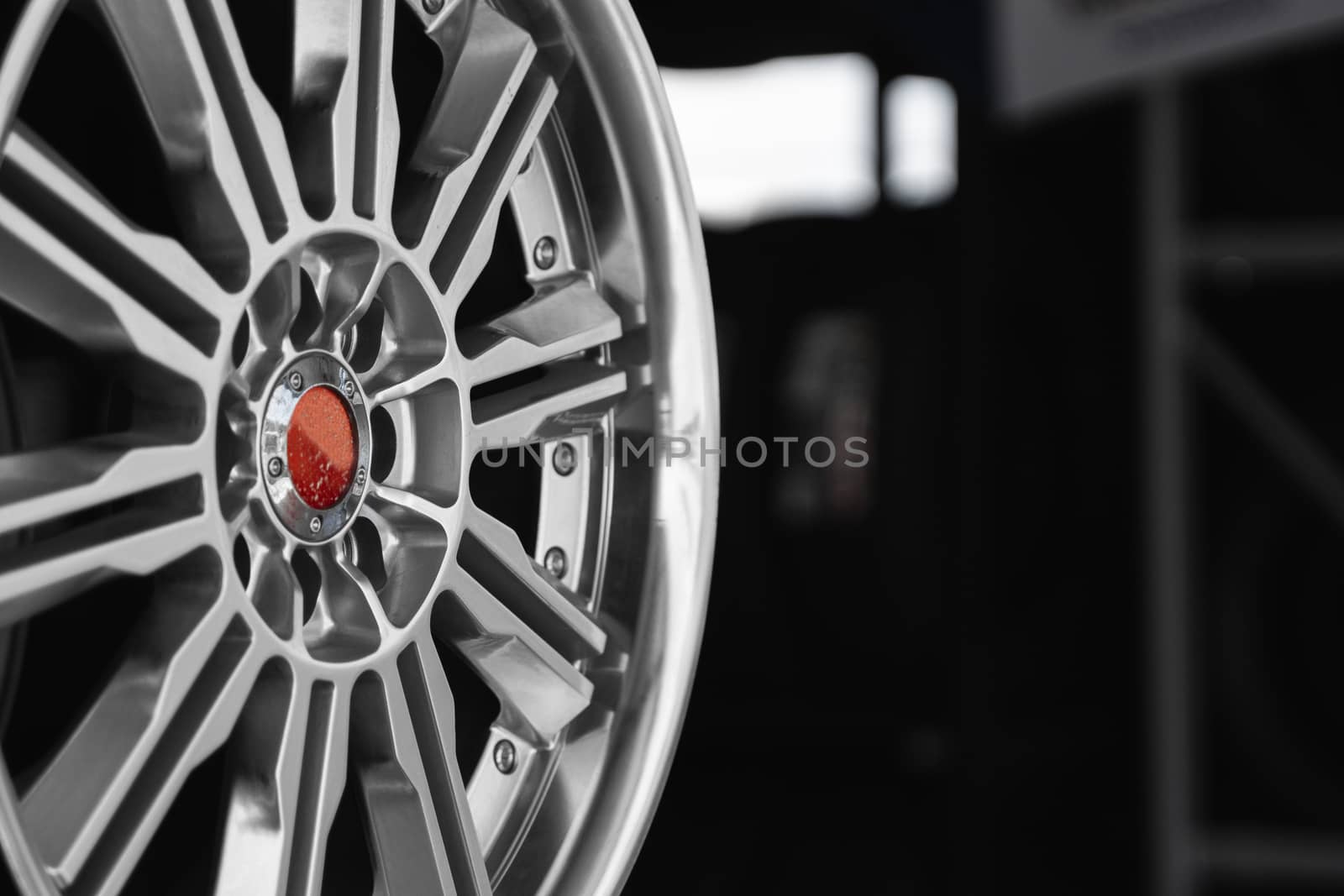 ar drives in the store with black background. Chrome car wheels for sale