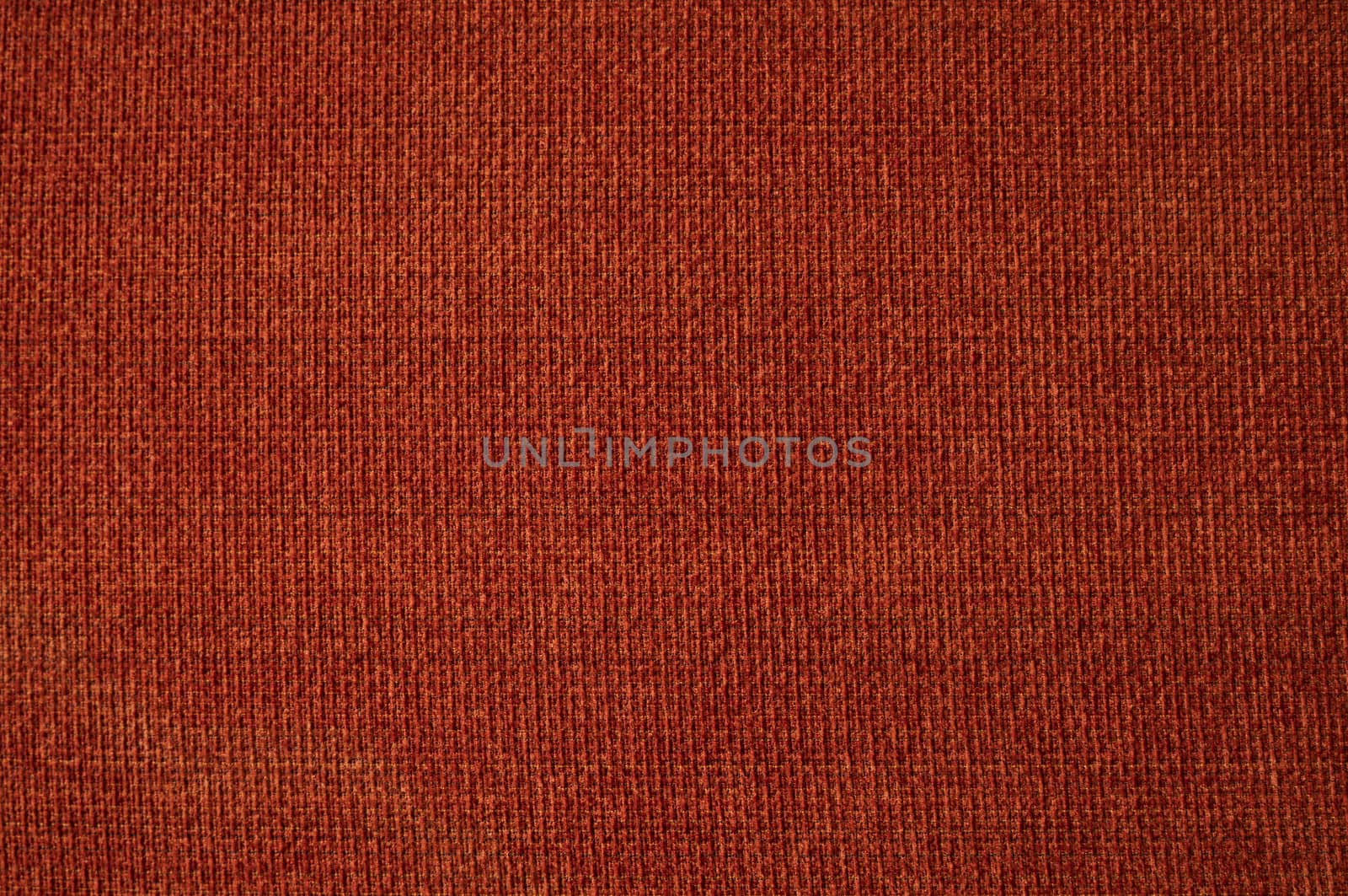 Red fabric textile texture in red color