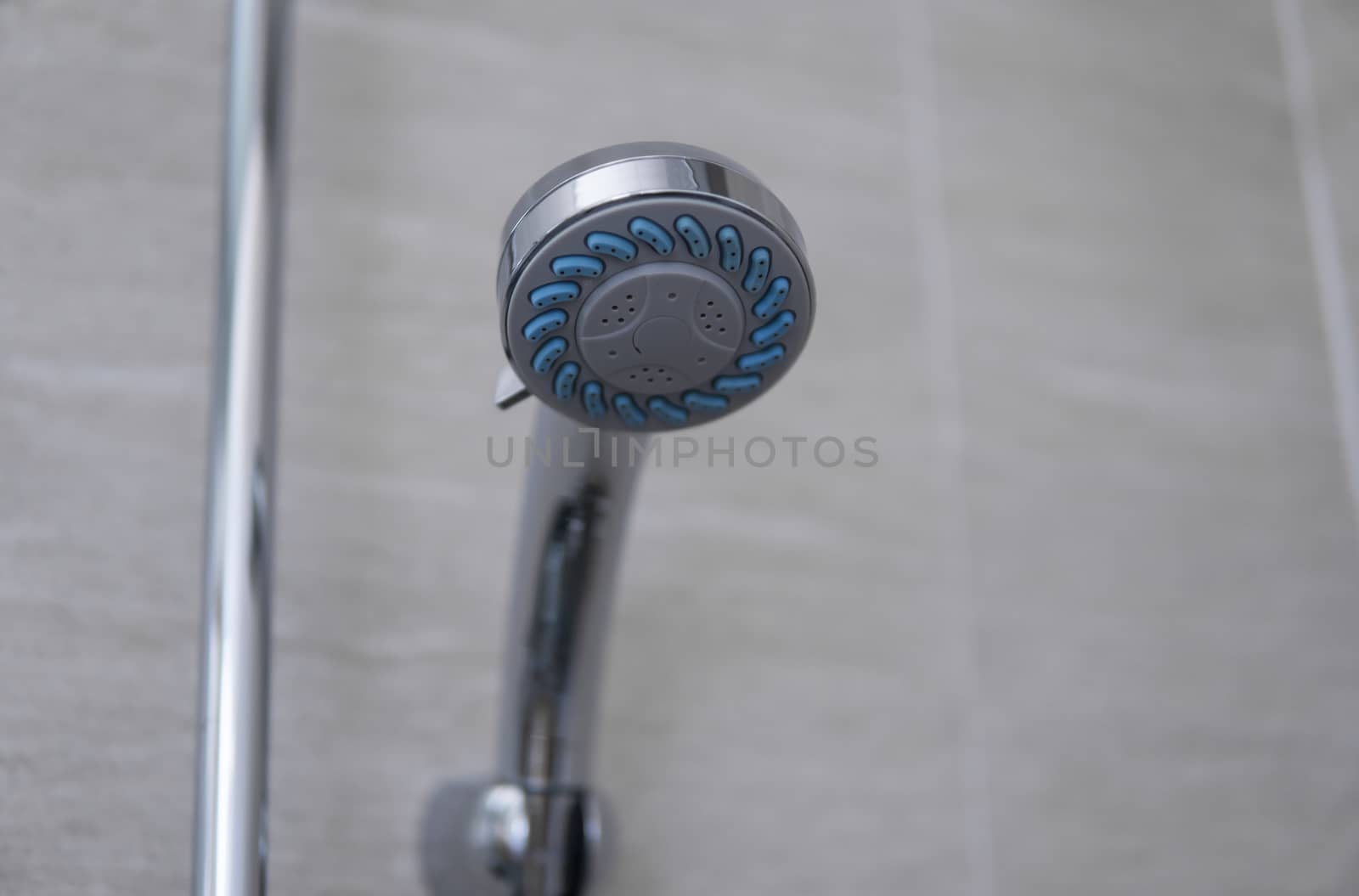 Modern shower head in modern bathroom. Shower head in bathroom with water spray or water flow. Feeling relax and enjoy in private bathroom. Fresh water flow from shower head for cleaning body dirty