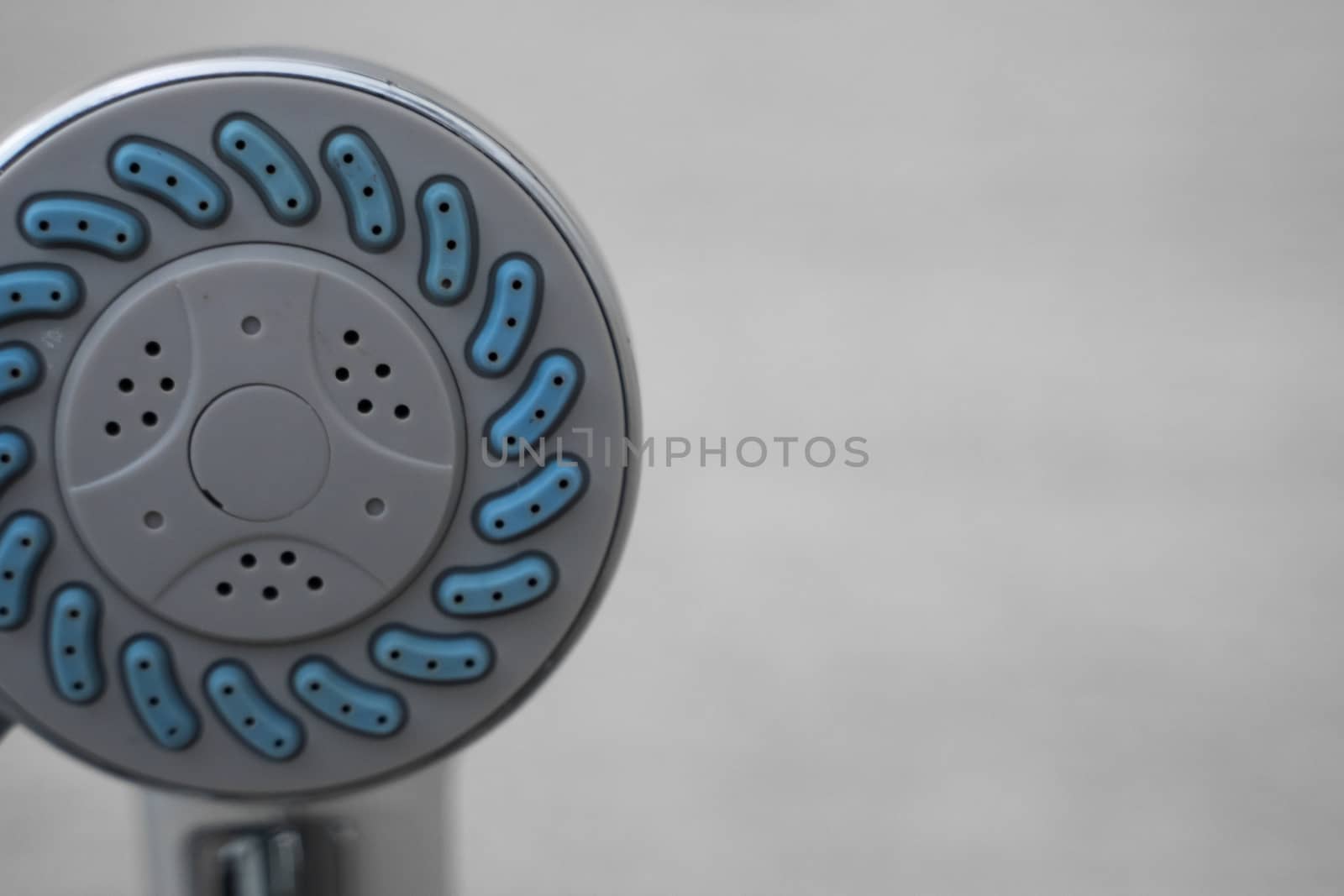 Modern shower head in modern bathroom. Shower head in bathroom with water spray or water flow. Feeling relax and enjoy in private bathroom. Fresh water flow from shower head for cleaning body dirty