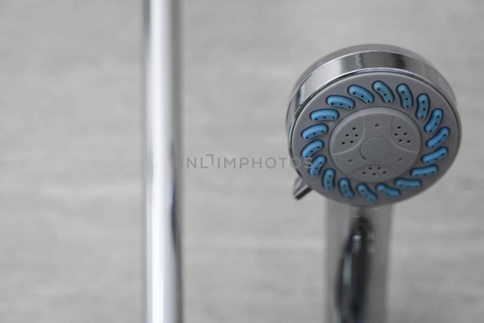 Modern shower head in modern bathroom. Shower head in bathroom with water spray or water flow. Feeling relax and enjoy in private bathroom. Fresh water flow from shower head for cleaning body dirty