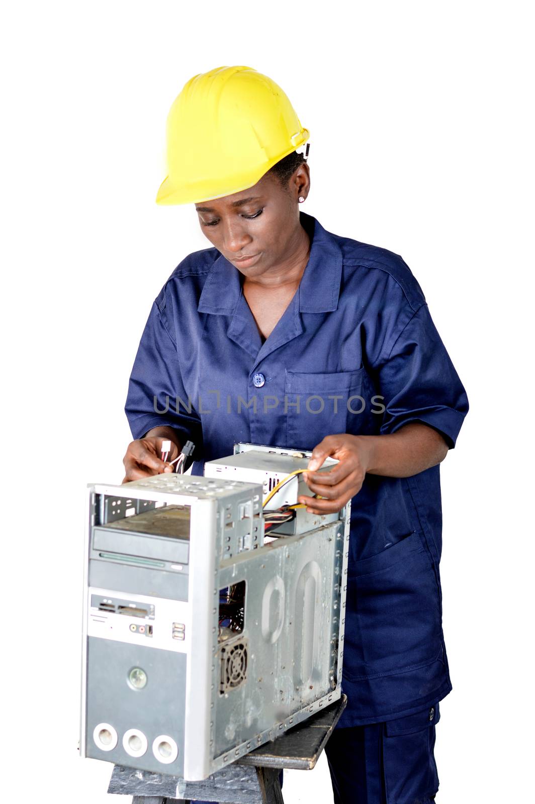 Computer maintenance technician tests the electrical circuits of the computer.