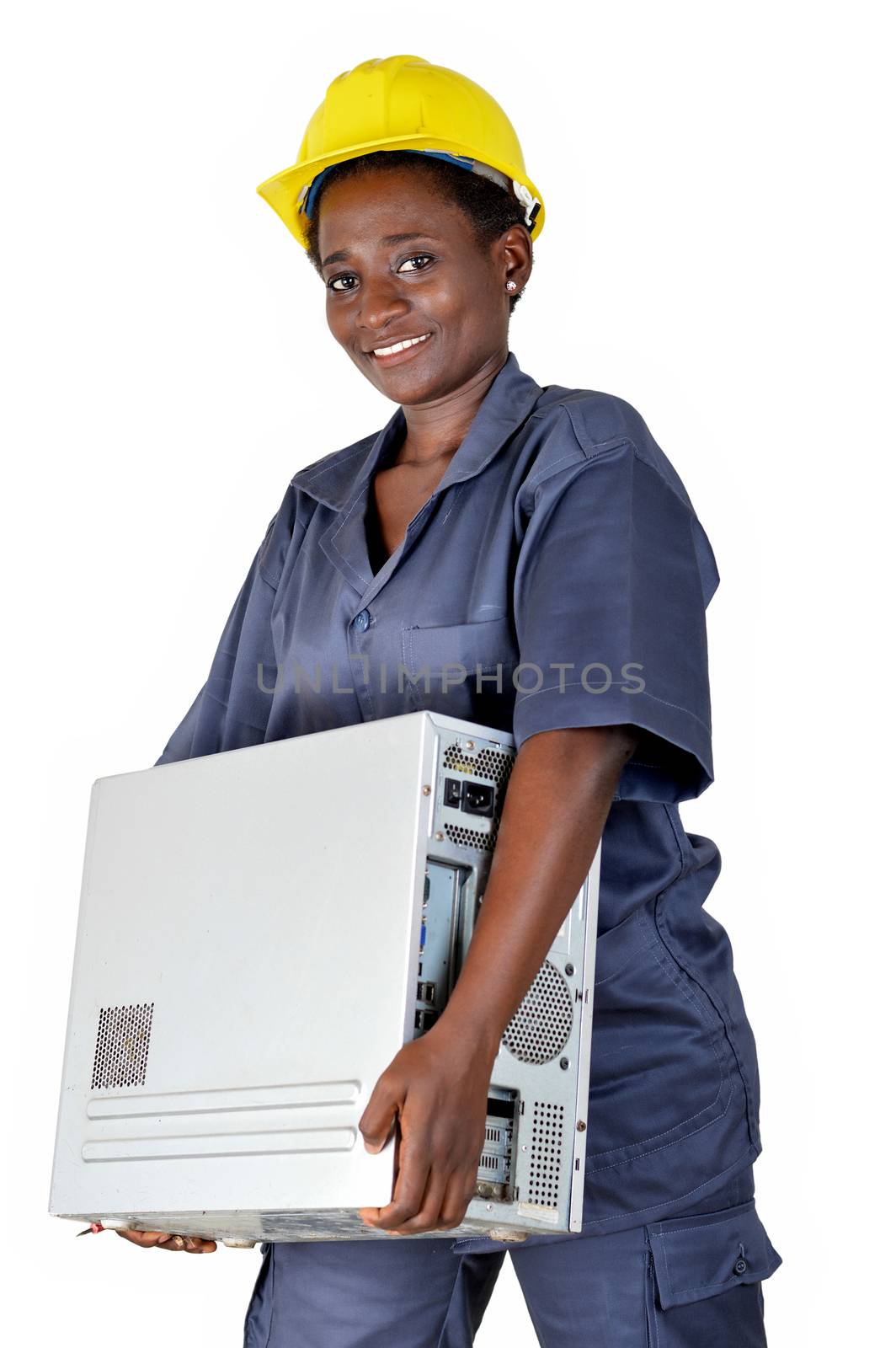 Young computer maintenance woman raises a computer CPU to go and do her maintenance in her workshop