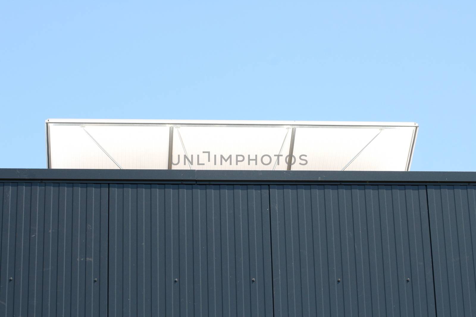 The open ventilation flap a sheet hall against the sky seen