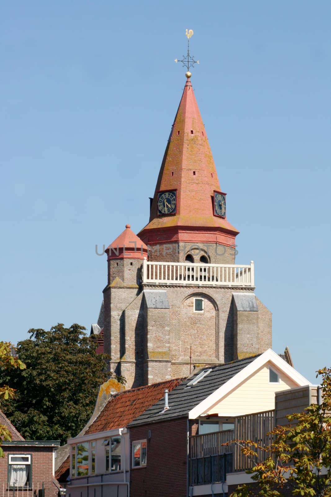 Red Tower with blue sky in the background