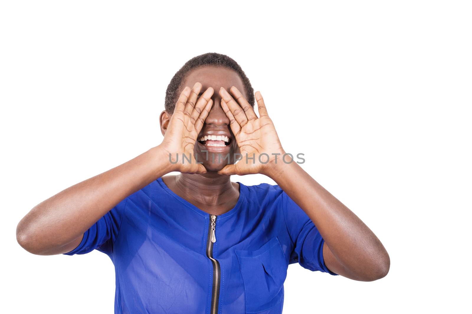 Young woman shouting to be heard by her colleagues