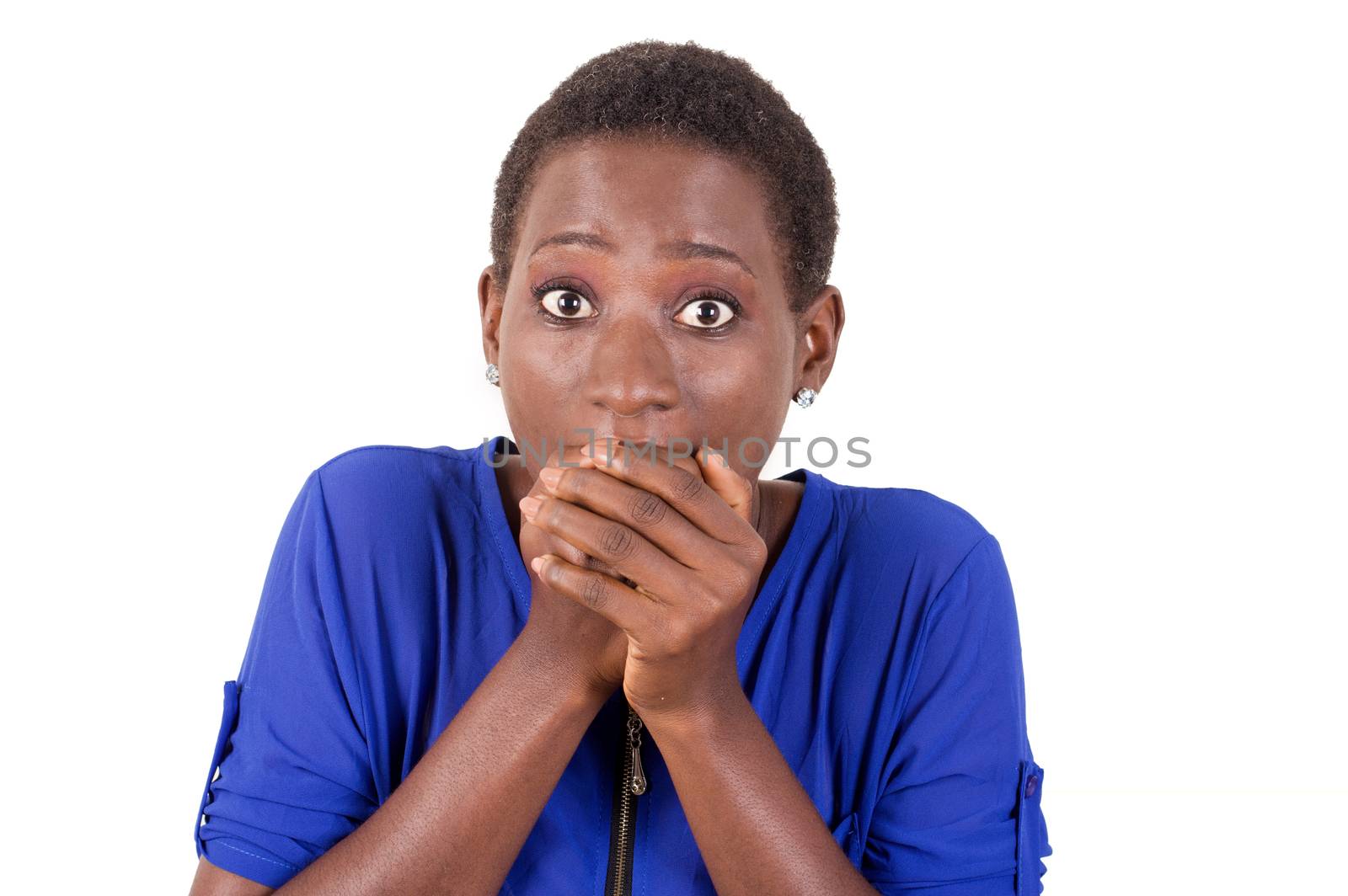 Young woman surprised to see something by putting her hands on her mouth.