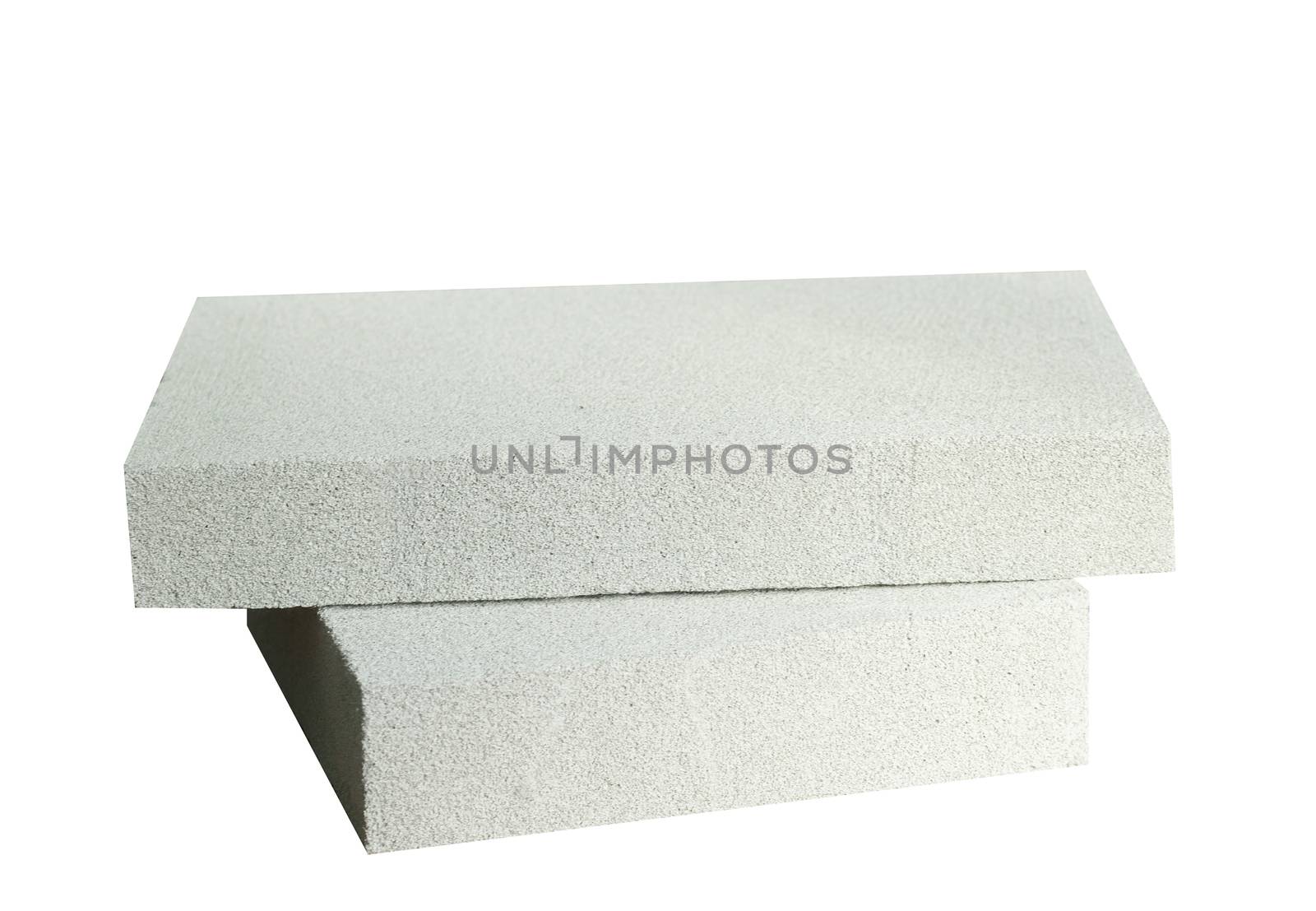 Lightweight construction brick isolated on white. Lightweight foamed gypsum block isolated on white. by Denys_N