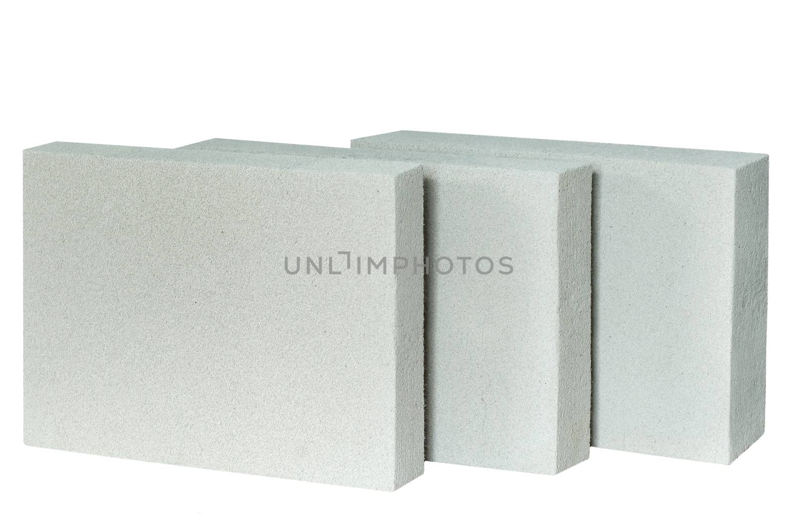 Lightweight construction brick isolated on white. Lightweight foamed gypsum block isolated on white. by Denys_N