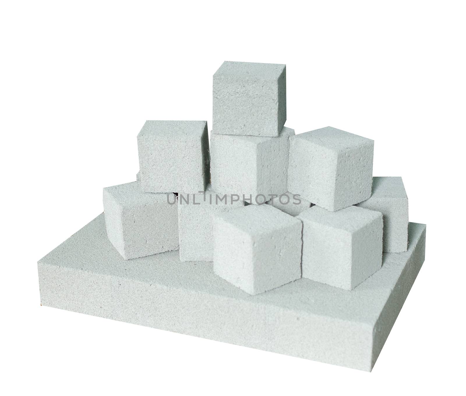 Lightweight construction brick isolated on white. Lightweight foamed gypsum block isolated on white. by Denys_N