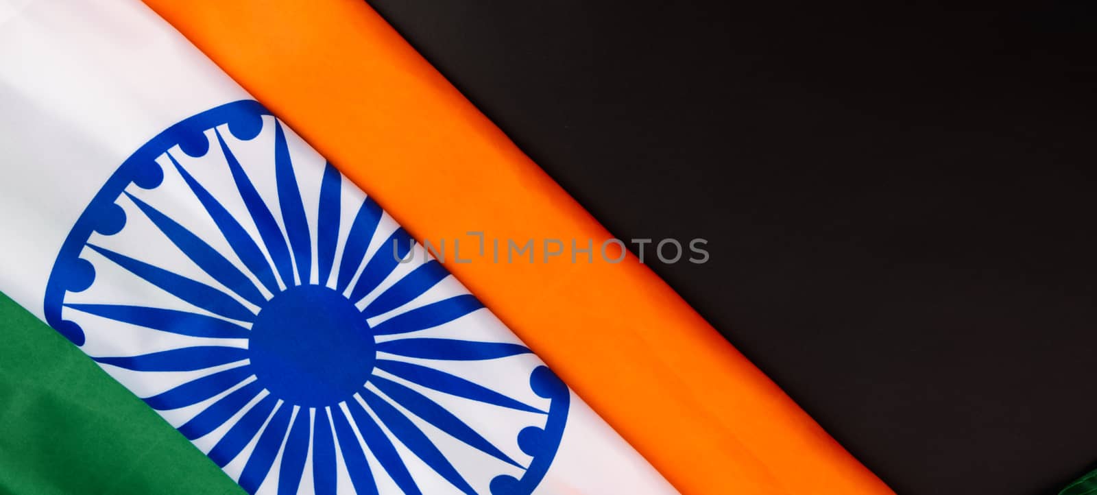 Indian republic day, flat lay top view, Indian flag on black background with copy space for your text