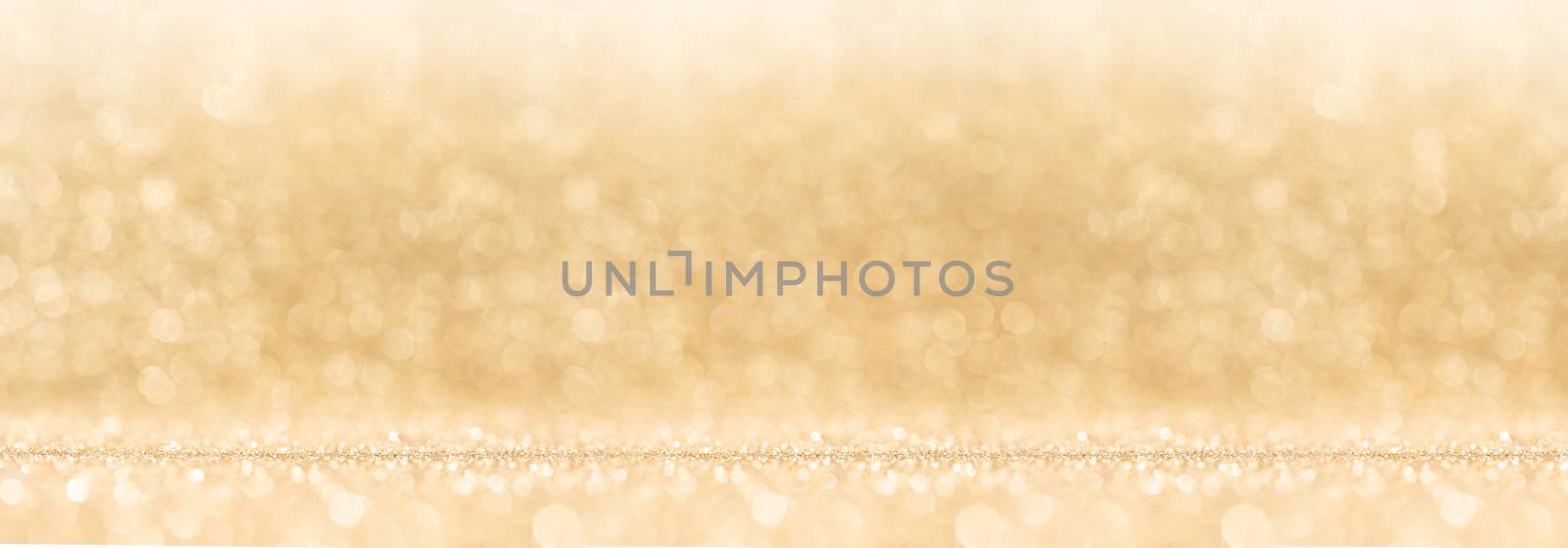 Shiny golden bokeh glitter lights abstract background, Christmas New Year party celebration concept