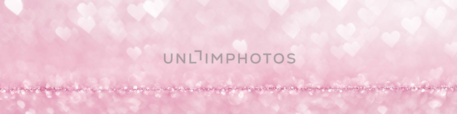 Shiny pink heart love bokeh glitter lights abstract background, Valentine's day party celebration concept