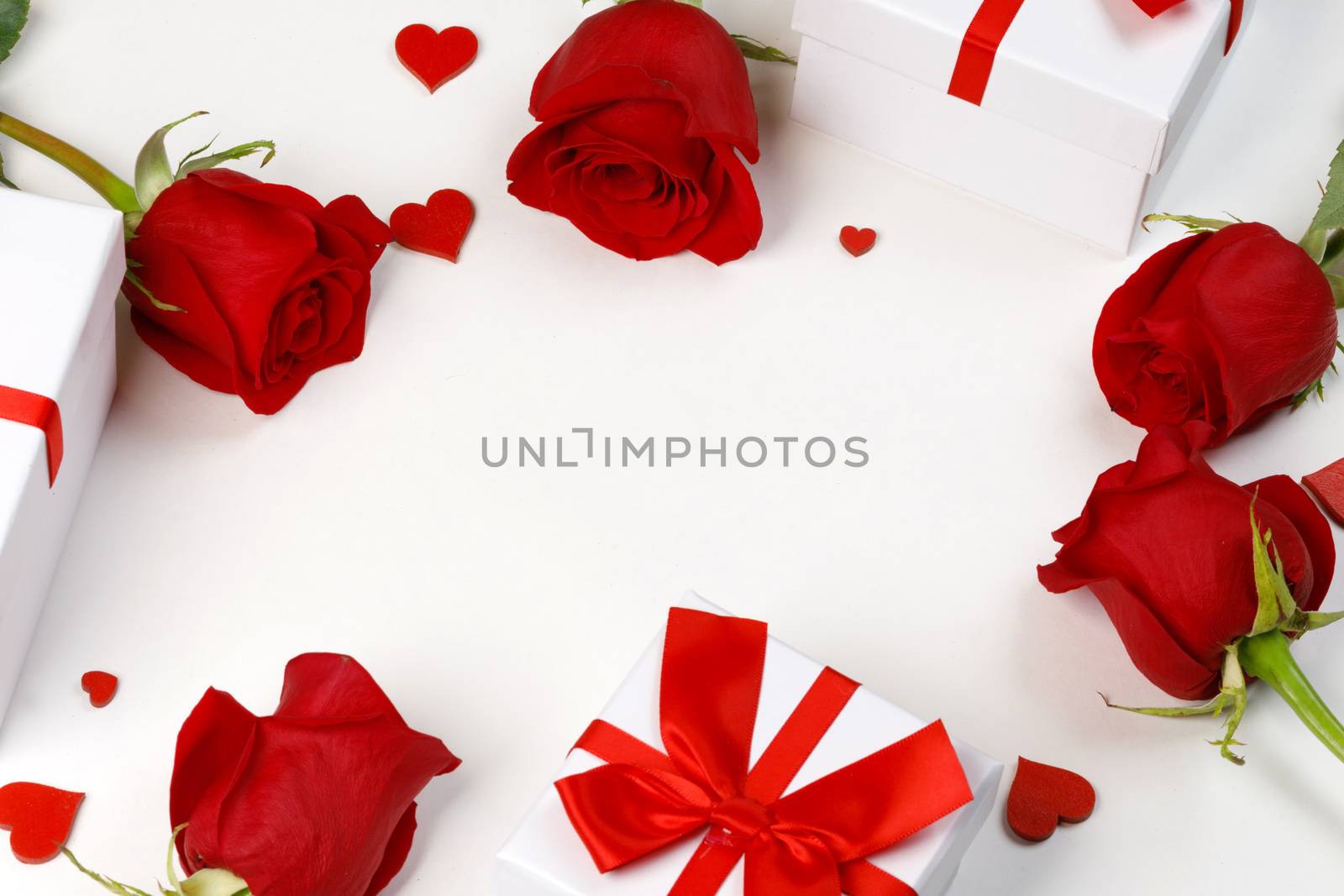 Red rose flowers gifts hearts and gifts composition isolated on white background top view with copy space. Valentine's day, birthday, wedding, Mother's day concept. Copy space